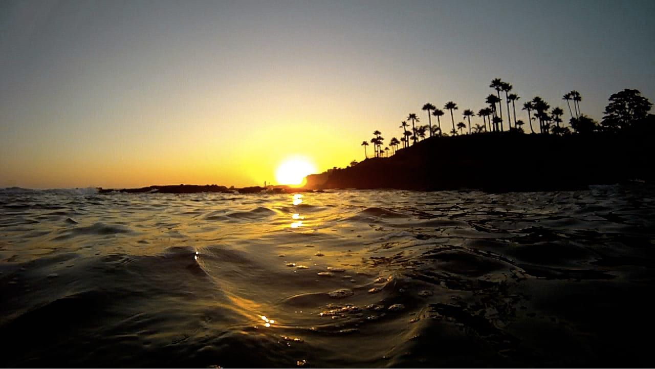 Snorkeling at Laguna Beach at sunset