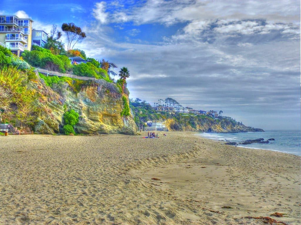 Thousand Steps Beach with its bluff and homes on the headland