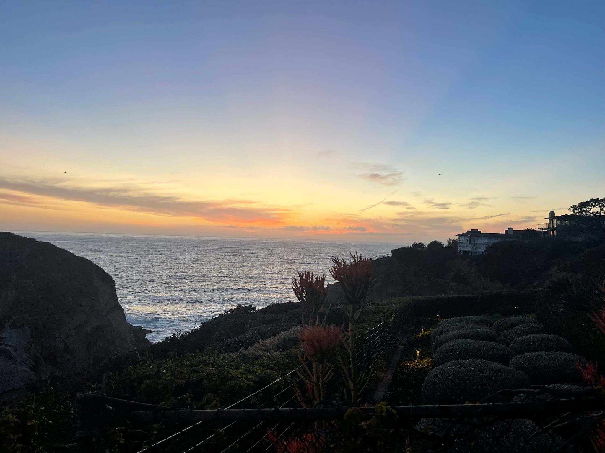 Sunset over the beach at Three Arch Bay in Laguna Beach